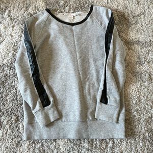 Gray crew neck sweatshirt with faux leather trim